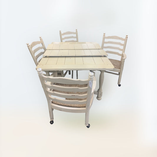 VINTAGE TABLE AND 4 ROLLING CHAIRS